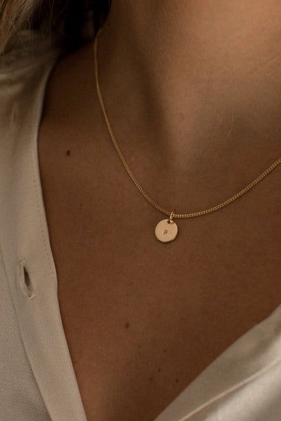A Keeping It Personal necklace in gold vermeil with one personalised initial pendant