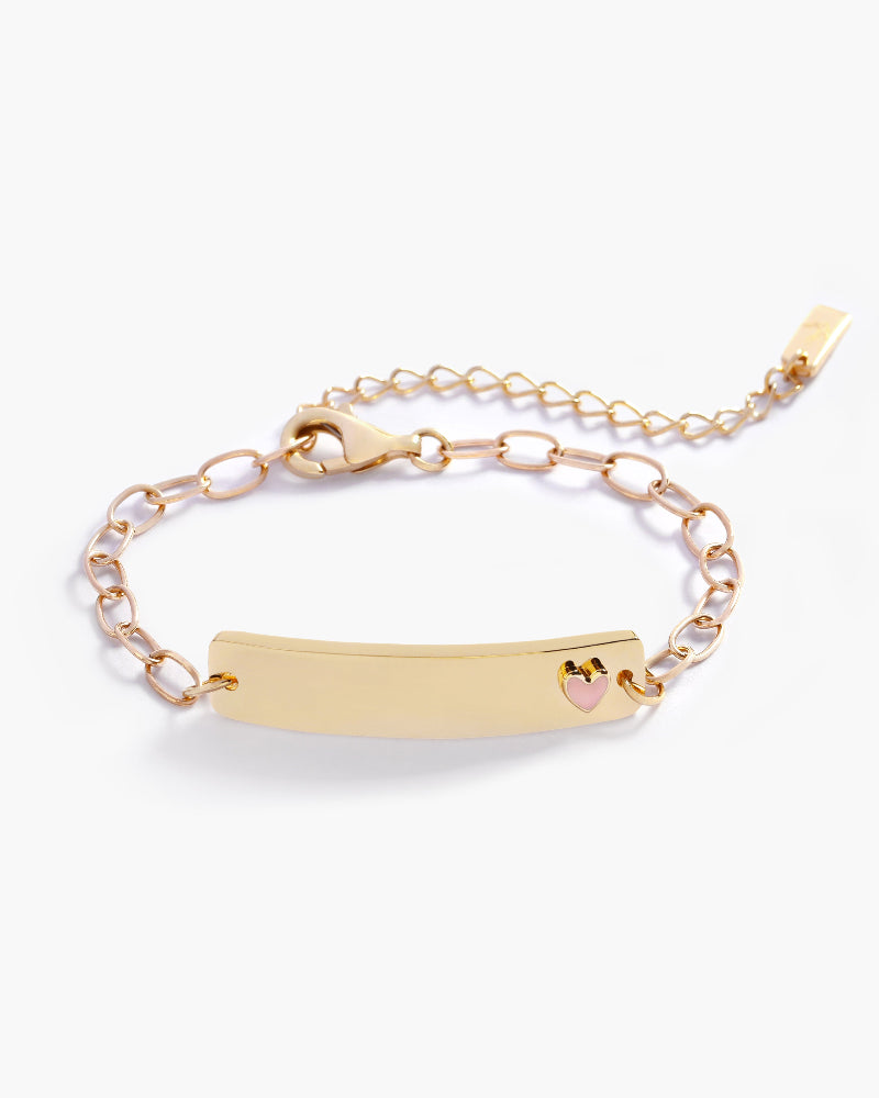 A 9ct solid gold Pink Darling Bracelet with a pink heart charm by Bluebird Jewellery, crafted as a timeless personalised baby bracelet.