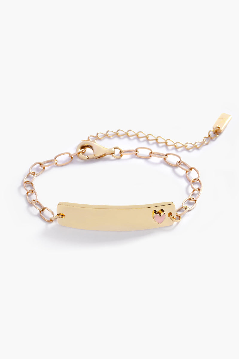 A 9ct solid gold Pink Darling Bracelet with a pink heart charm by Bluebird Jewellery, crafted as a timeless personalised baby bracelet.