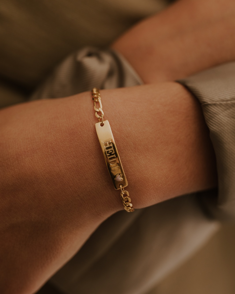 A close up look at a Pink Darling Bracelet in our child size with personalised name engraved on the front. A gorgeous keepsake bracelet that is personalised and meaningful by Bluebird Jewellery