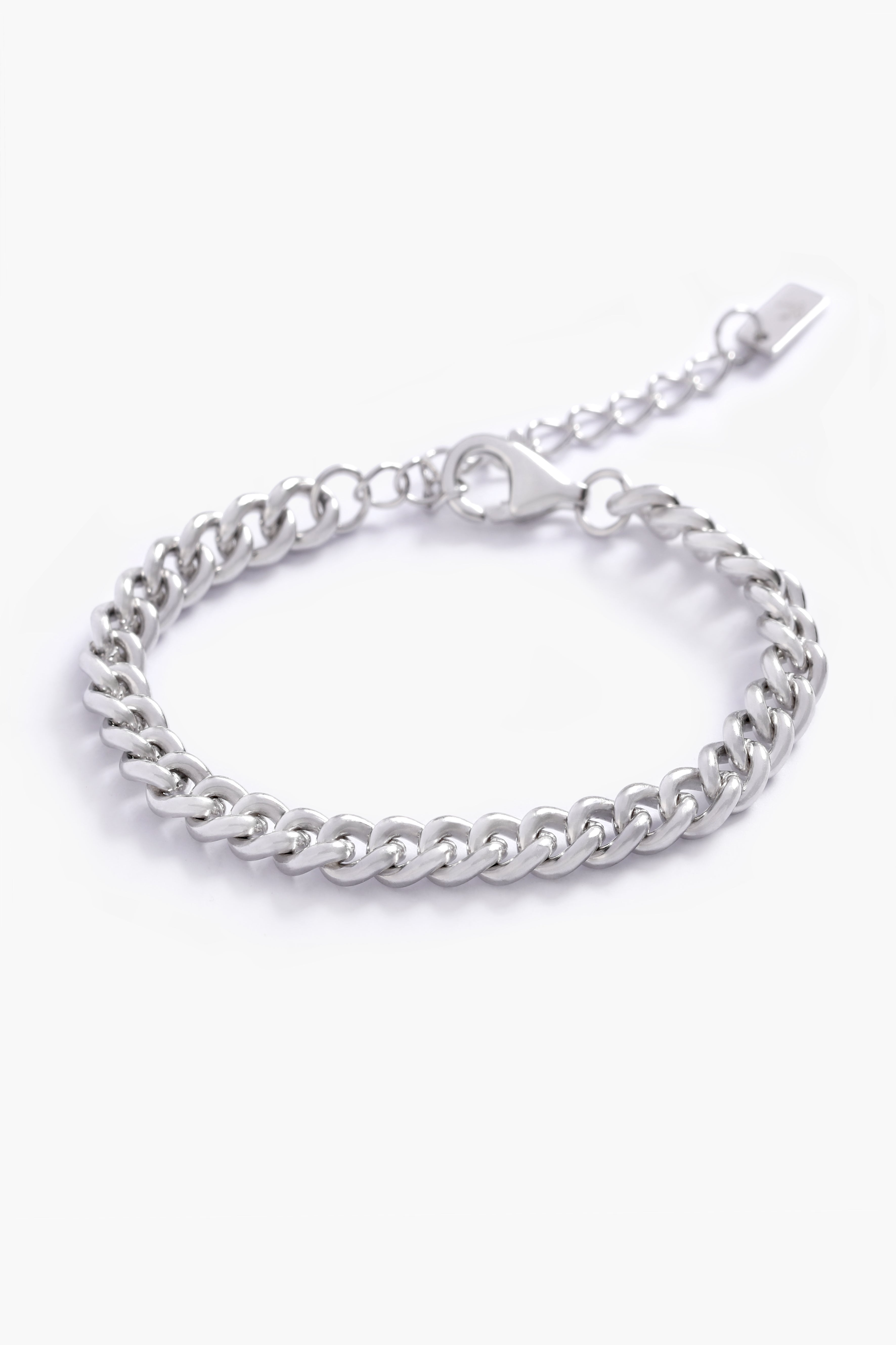 A minimalist silver bracelet displayed on a white background, designed for everyday wear and effortless elegance.