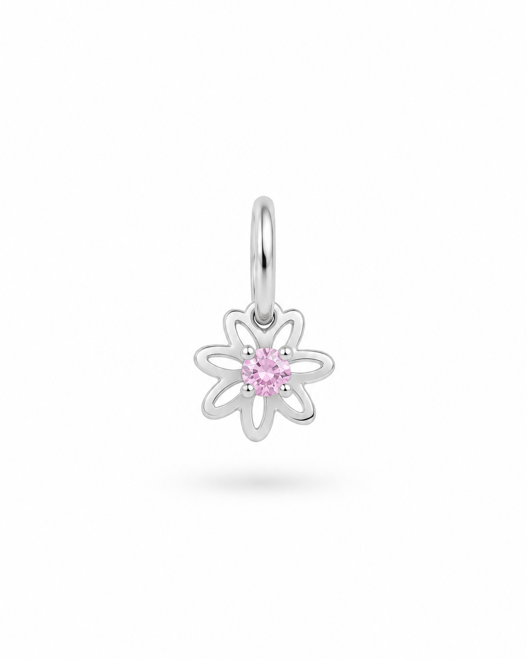 A silver flower-shaped charm pendant featuring a small pink gemstone in the center, suspended from a silver bail, shown against a plain white background.