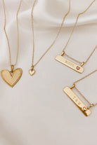 Engraved Pink Darling Bar Necklace in gold with heart detail, a timeless keepsake jewellery gift for children, women and mums.