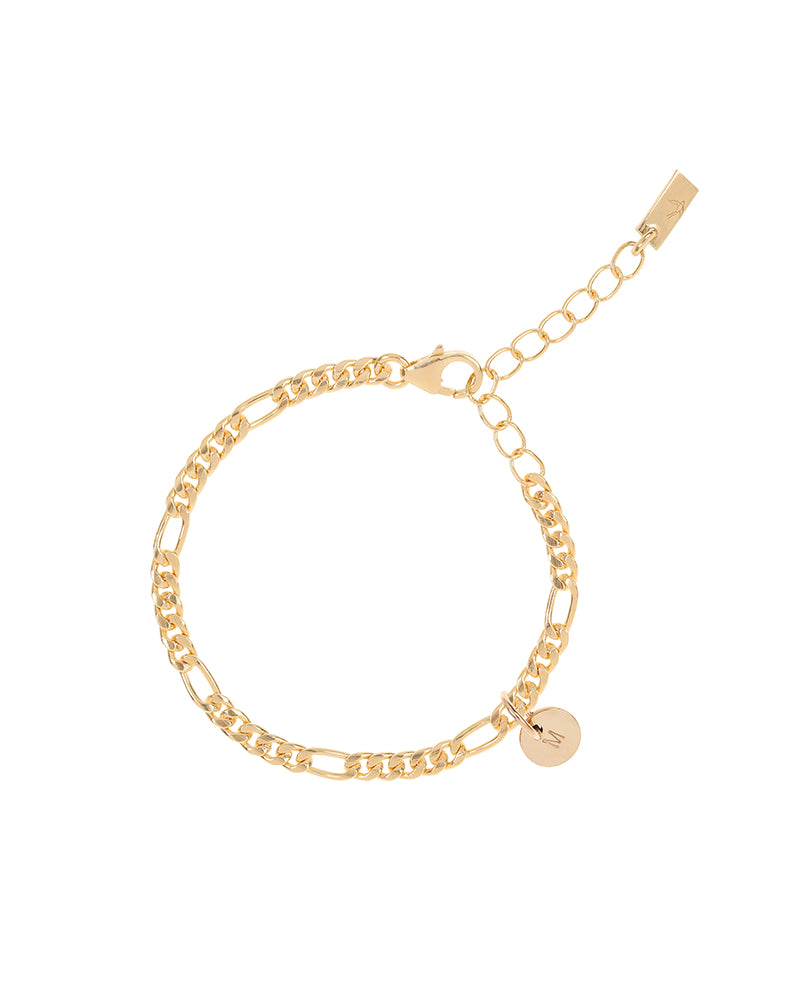 A Figaro Bracelet has a 9ct solid Gold Petite initial pendant on it by Bluebird Jewellery