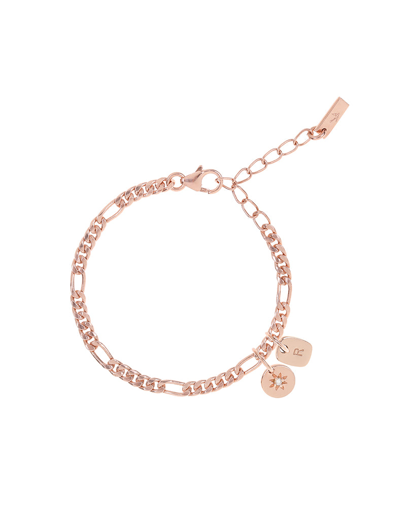 A detailed image of the Figaro Bracelet by Bluebird Jewellery, a classic rose gold chain bracelet with a 3cm extension for a perfect, adjustable fit along with an initial pendant and daisy pendant.