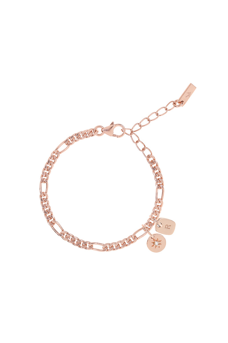 A detailed image of the Figaro Bracelet by Bluebird Jewellery, a classic rose gold chain bracelet with a 3cm extension for a perfect, adjustable fit along with an initial pendant and daisy pendant.
