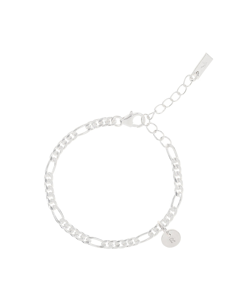 The Figaro Bracelet with silver initial pendant by Bluebird Jewellery, a classic and timeless chain design crafted as an elegant statement piece for all ages.
