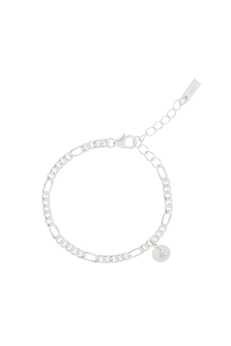 The Figaro Bracelet with silver initial pendant by Bluebird Jewellery, a classic and timeless chain design crafted as an elegant statement piece for all ages.