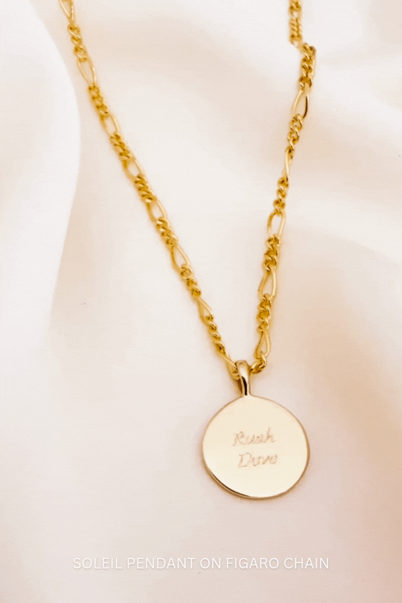 Bluebird Co's figaro necklace and soleil pendant in gold.