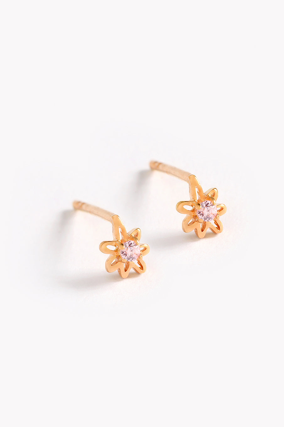 Petite Daisy Stud in Rose Gold Vermeil with a small pink cubic zirconia in the center