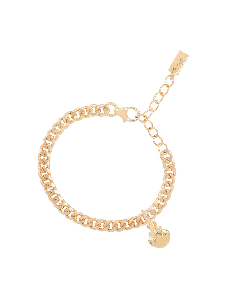A close-up of a gold Cuban Link Chain Bracelet adorned with a mermaid shell charm, photographed on a white background to highlight its elegant detailing by Bluebird Jewellery.