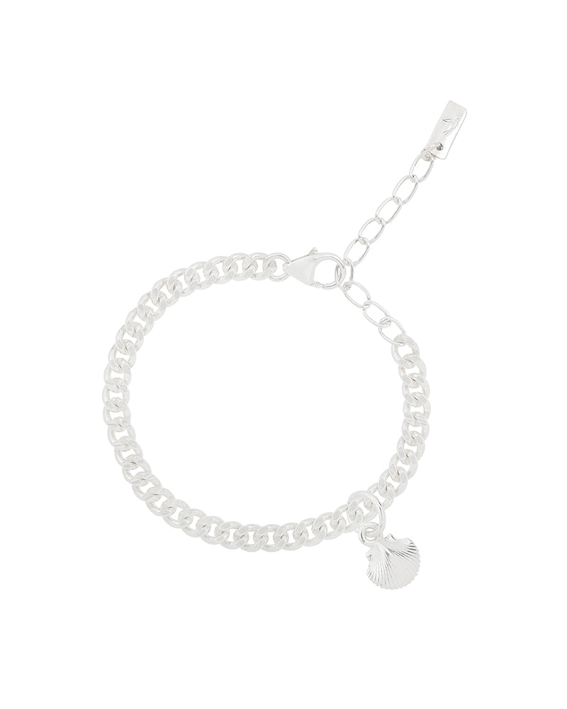 A delicate silver Cuban Link Chain Bracelet with a mermaid shell charm, designed as a timeless keepsake piece