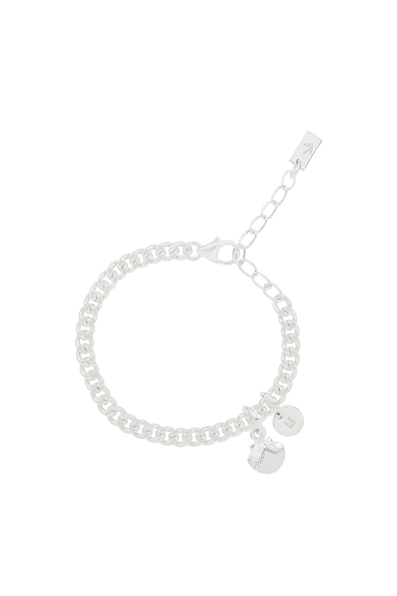 A detailed image of a silver Lace Chain Bracelet with a mermaid shell charm and initial pendant, designed as an elegant piece of fine personalised jewellery.