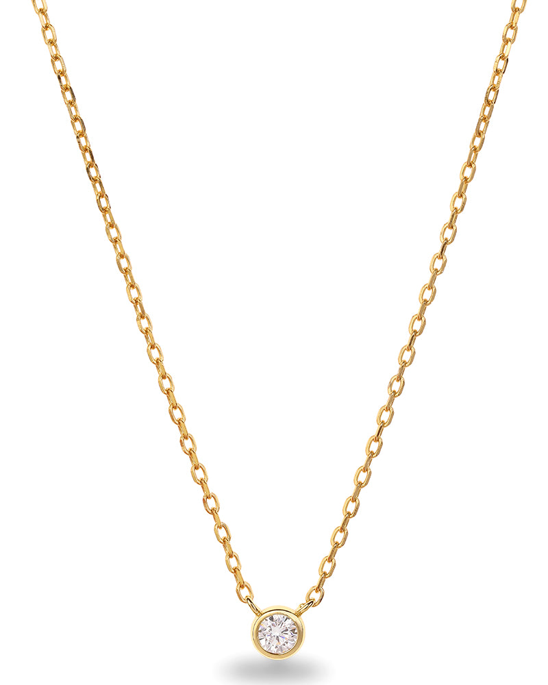 The Lumé Necklace by Bluebird Jewellery, a thoughtful gold pendant inspired by light and crafted as an elegant fine jewellery piece.