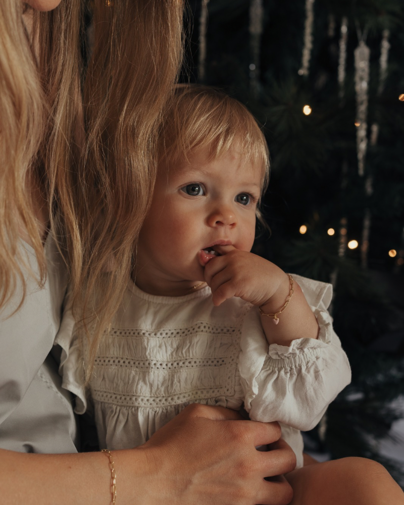 Matching Darling Posie bracelets worn by a mum and her daughter