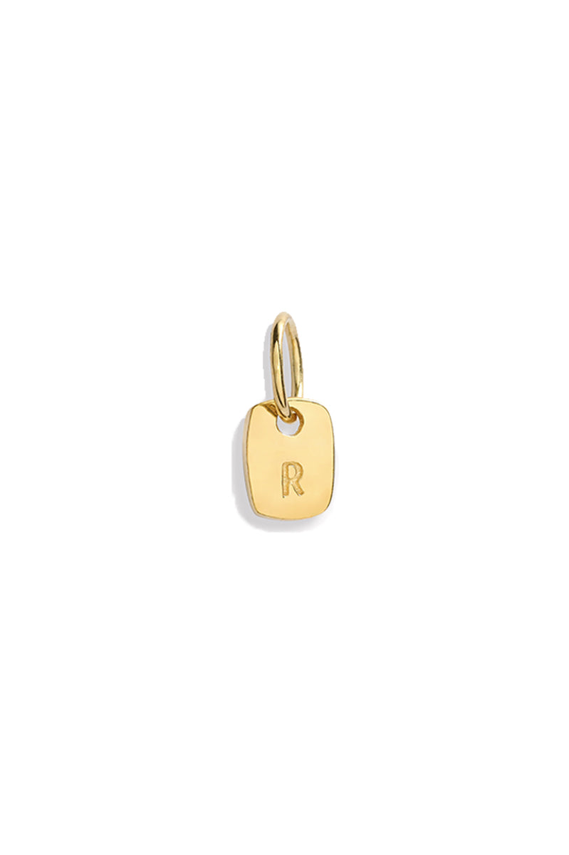 The Mini Rectangular Pendant by Bluebird Jewellery features gentle curves and a luxe, modern silhouette. Personalised with your chosen letter, it embodies feminine elegance and can be worn beautifully on any necklace, bracelet, or anklet chain.