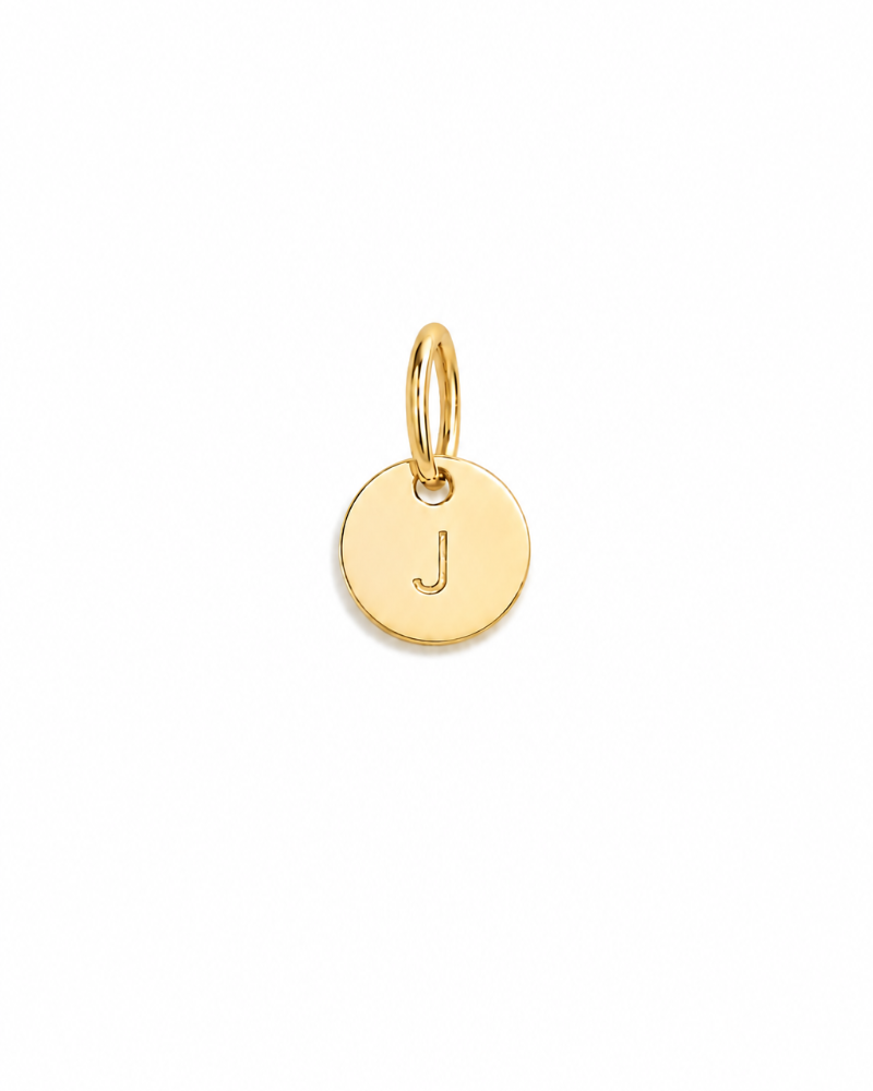 A classic round Petite Gold Vermeil Initial Pendant from Bluebird Jewellery, personalised with your chosen letter and designed to be worn elegantly on any necklace, bracelet, or anklet chain.