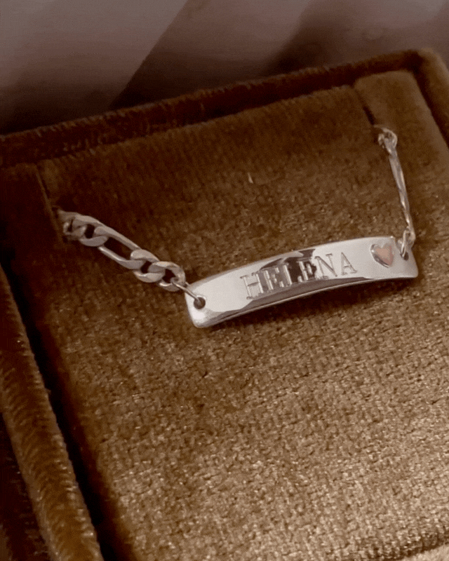 Bluebird Co engraved Pink Darling bracelet in silver, packaged in velvet box.