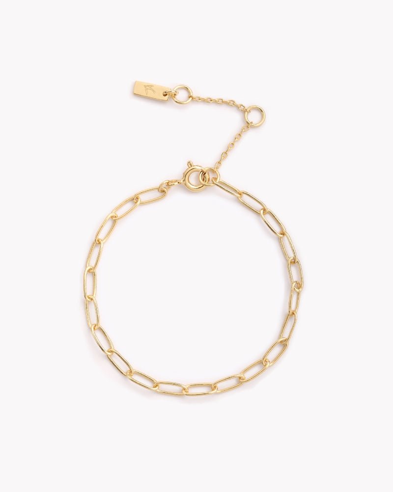 A minimalist gold chain bracelet crafted in fine jewellery style, displayed on a white background to highlight its craftsmanship by Bluebird Jewellery.