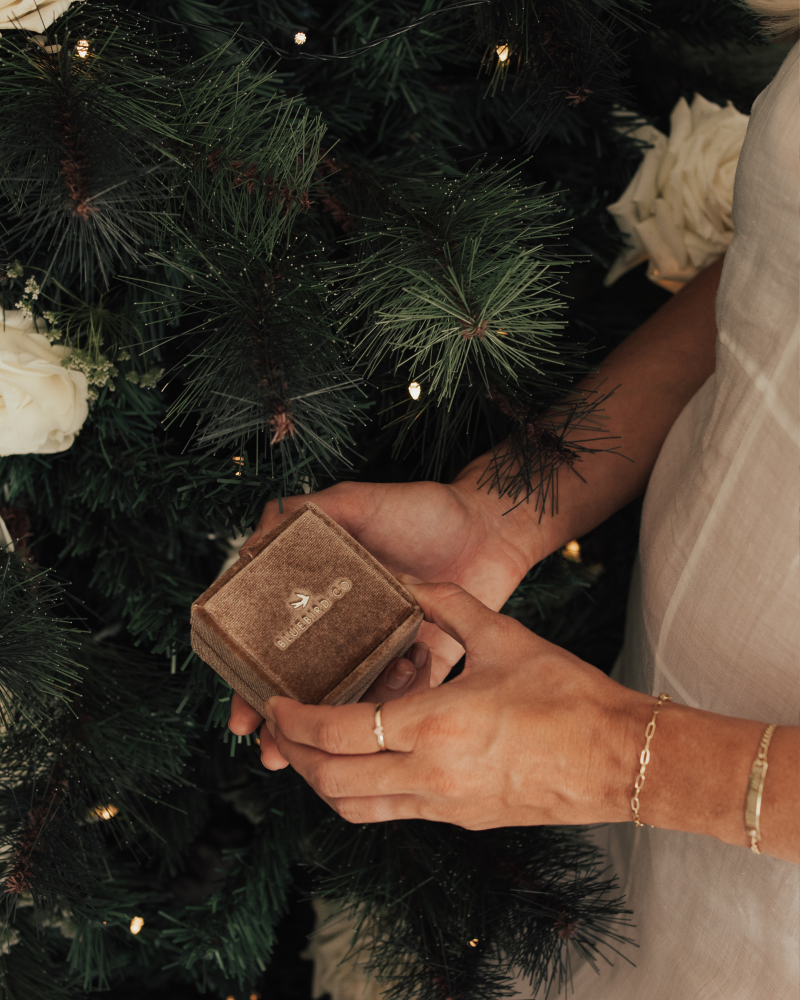 A woman wearing the Posie and Darling Bracelet styled with the matching Darling Ring for an elegant look by Bluebird Jewellery.
