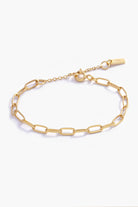A close-up of an elegant gold chain link bracelet, crafted in fine jewellery style for a modern, feminine touch.