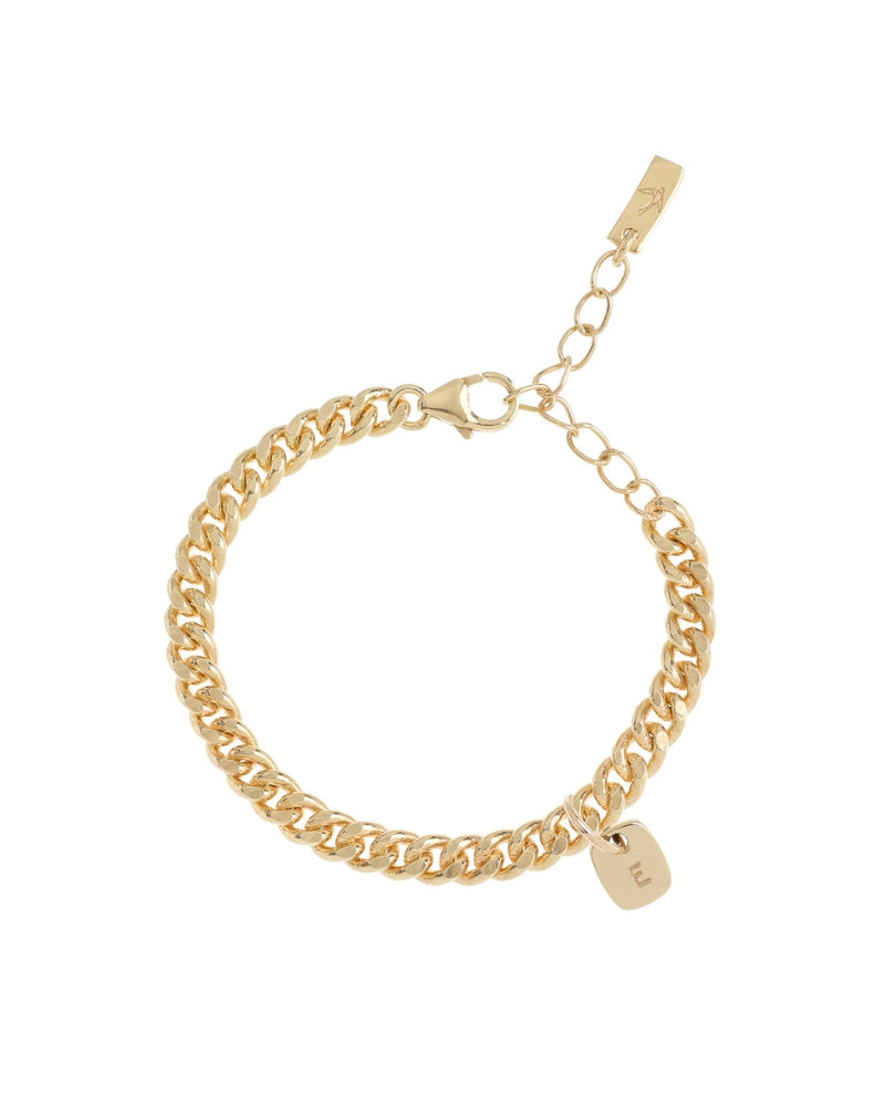 A detailed view of a gold Cuban Link Chain Necklace with a soild gold rectangular pendant, crafted as timeless minimalist jewellery