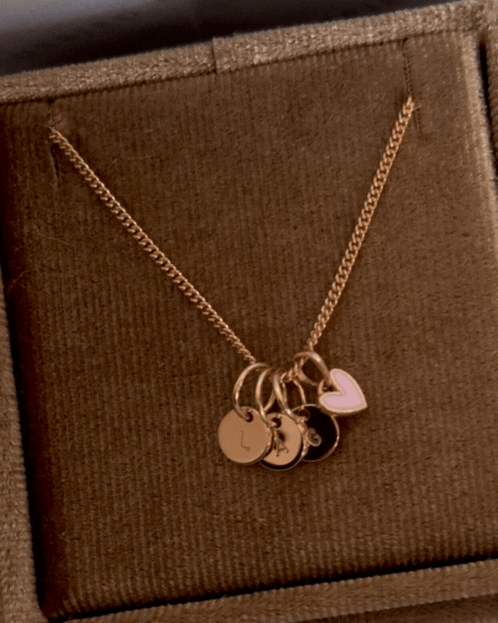Bluebird Co's rose gold initial pendants with mini pink sweetheart pendants