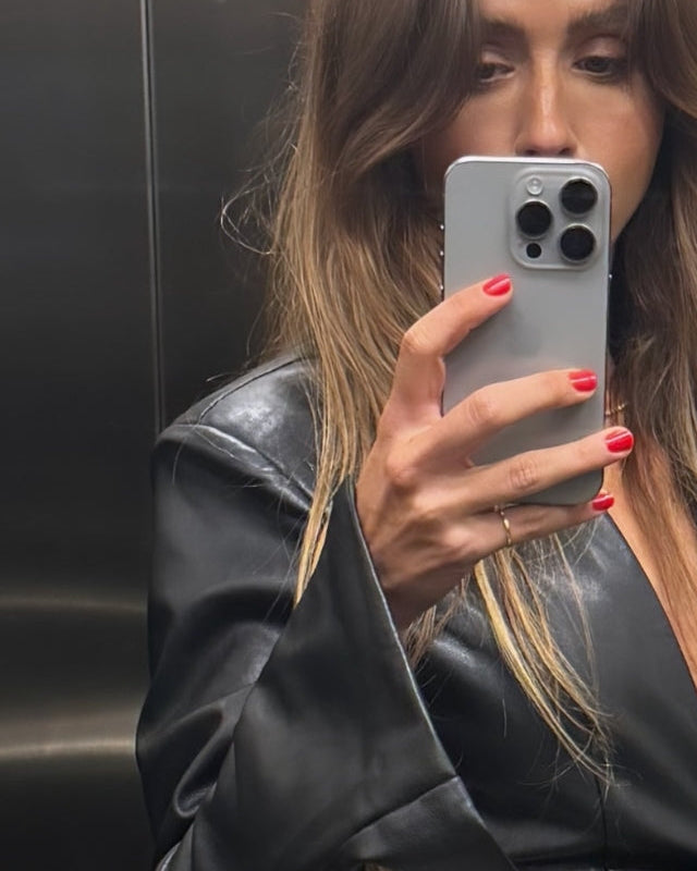 Ruby Tuesday Matthews wears the Signature Pinky Ring in size 4 with a leather jacket.
