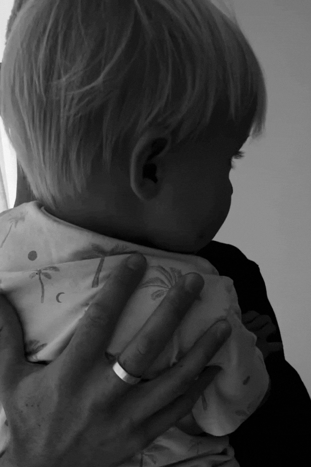 Bluebird Co's signature mens ring. Dad holding toddler