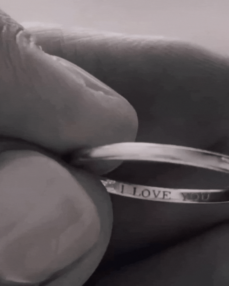 Bluebird Co's signature pinky ring with engravement
