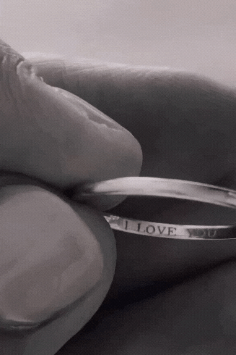 Bluebird Co's signature pinky ring with engravement