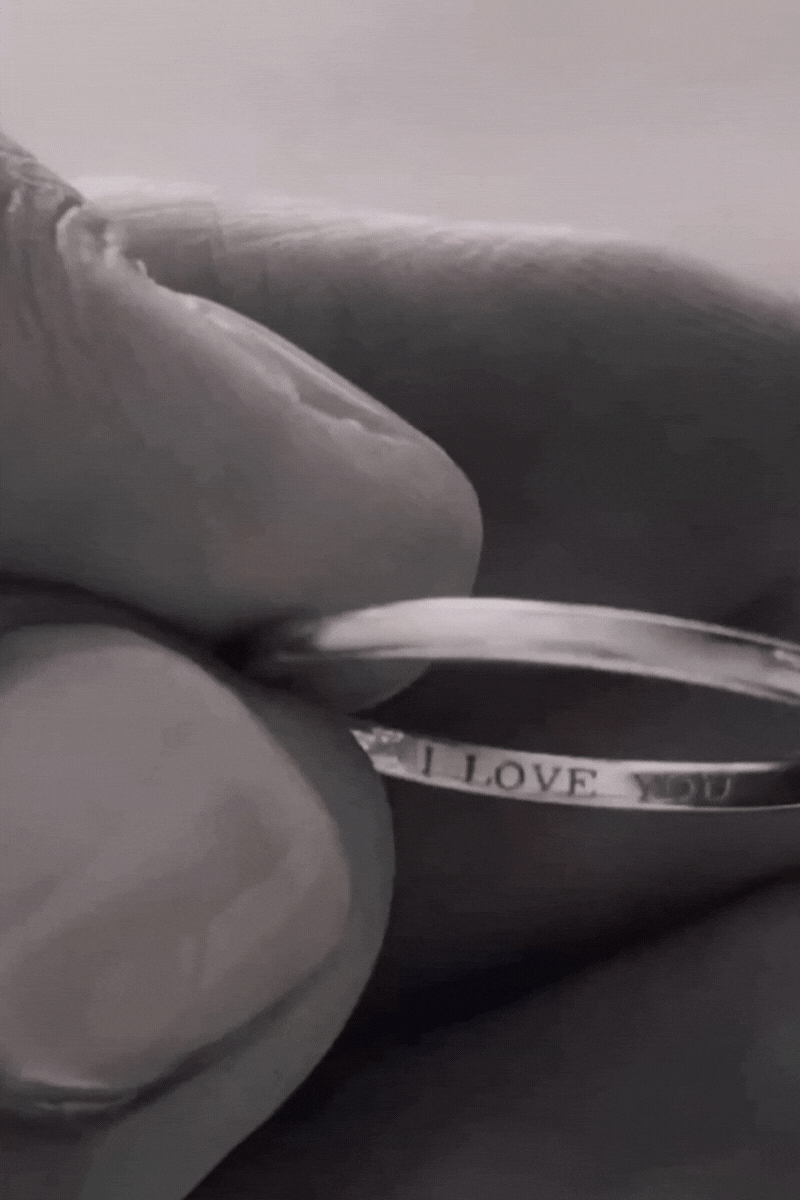 Bluebird Co's signature pinky ring with engravement