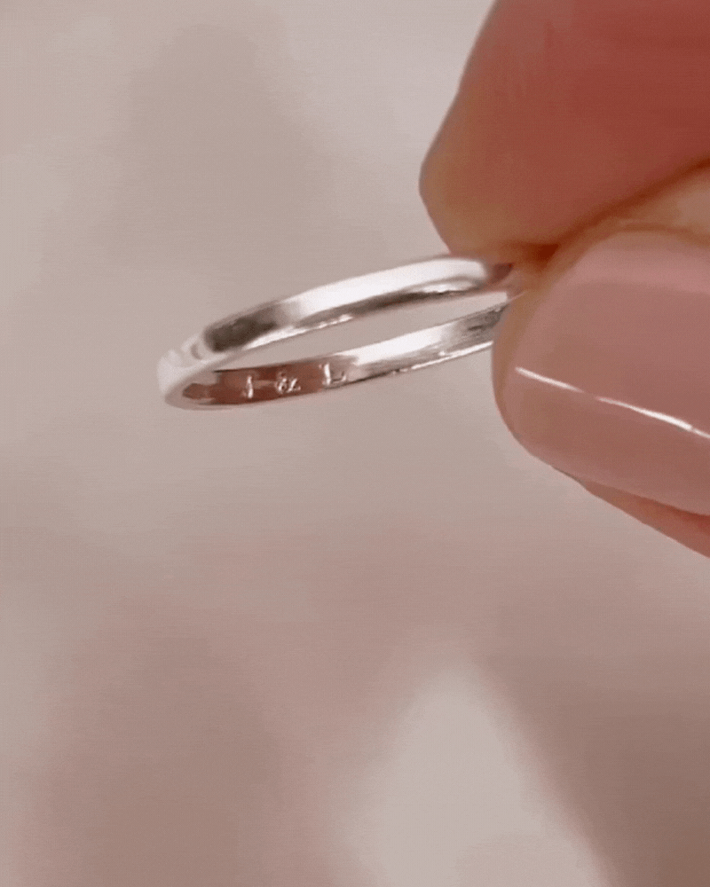 Bluebird Co's signature ring in silver with engraving.