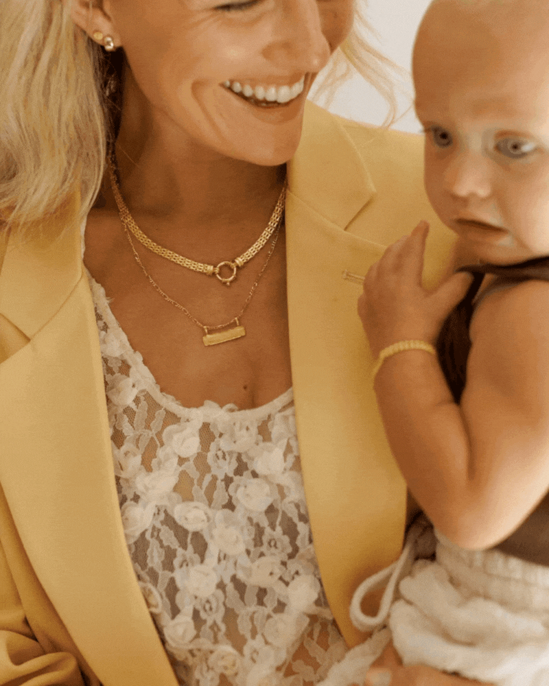 Bluebird Co's signature bar necklace and signature statement necklace and signature bracelet in gold
