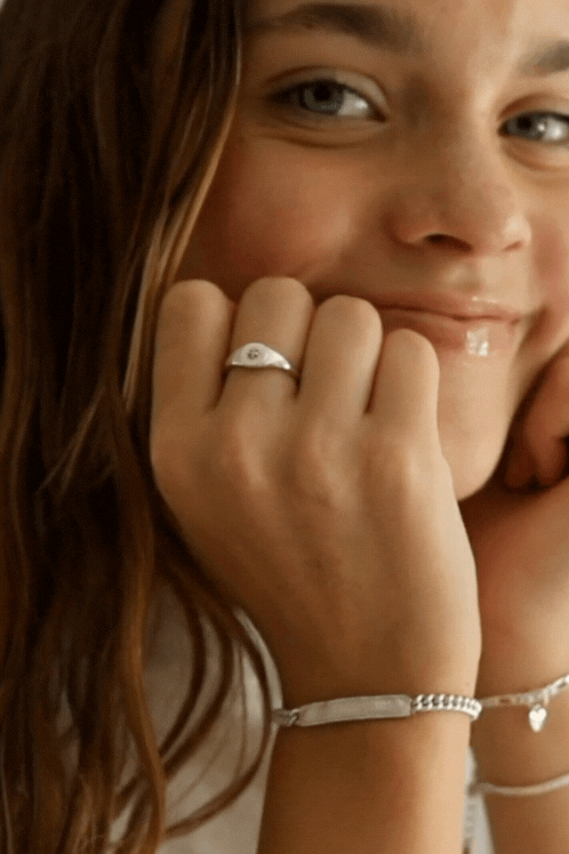 Bluebird Co's signature bracelet featuring engravement on the bracelet