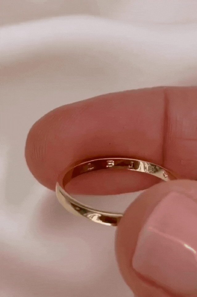 Size 7 signature ring with engraving.