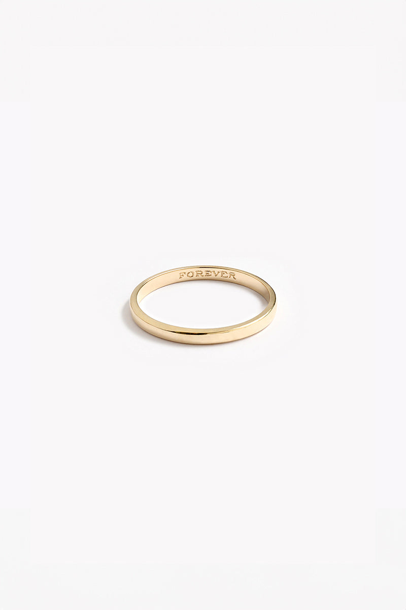 A Signature Pinky Ring with the word 'FOREVER' engraved inside of it.