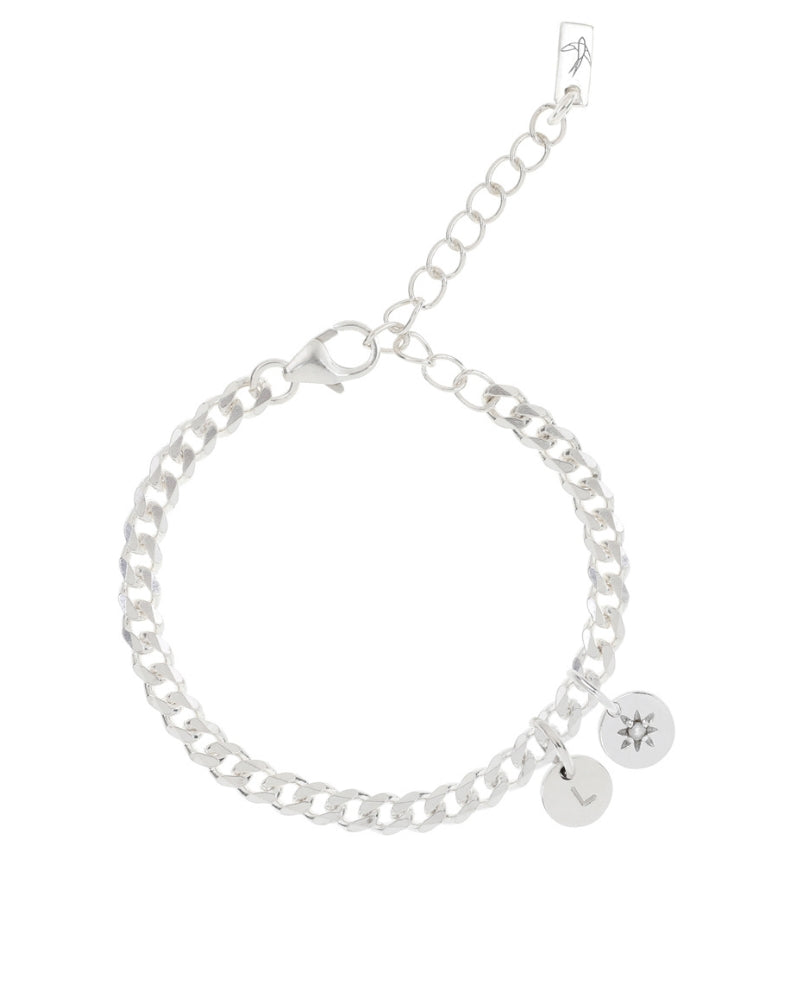 A silver Cuban Link Chain with a vintage pearl pendant and engraved initial charm, crafted as an elegant and meaningful fine jewellery piece.