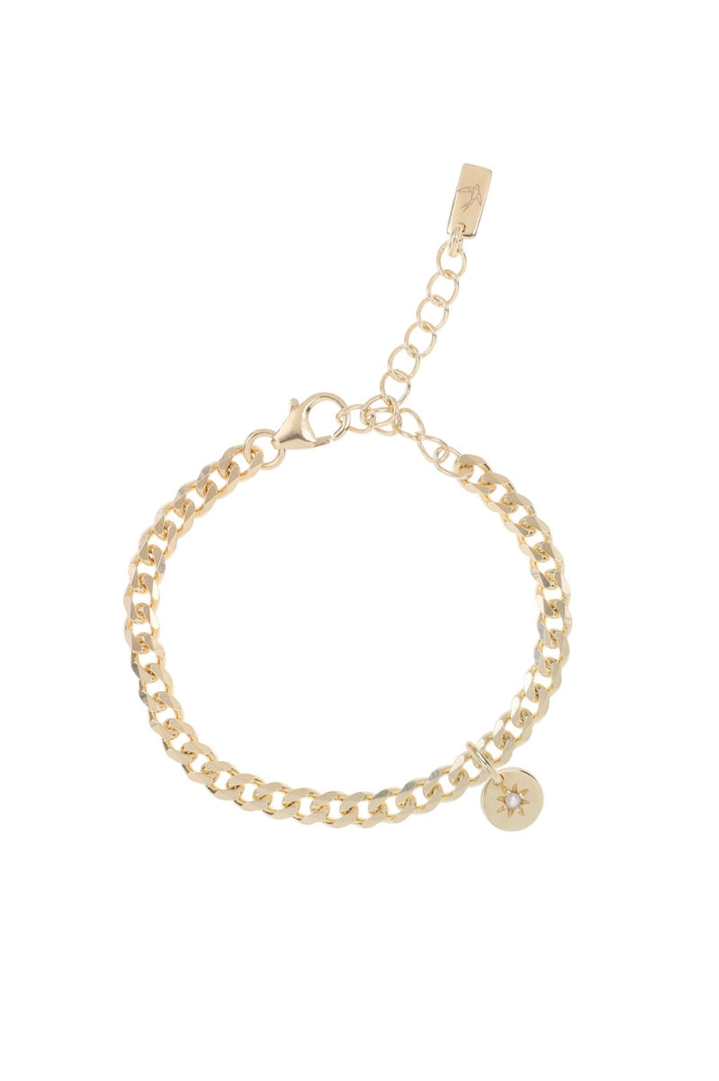 A simple and timeless Cuban Link Chain featuring a single vintage pearl pendant, crafted in elegant fine jewellery style by Bluebird Co