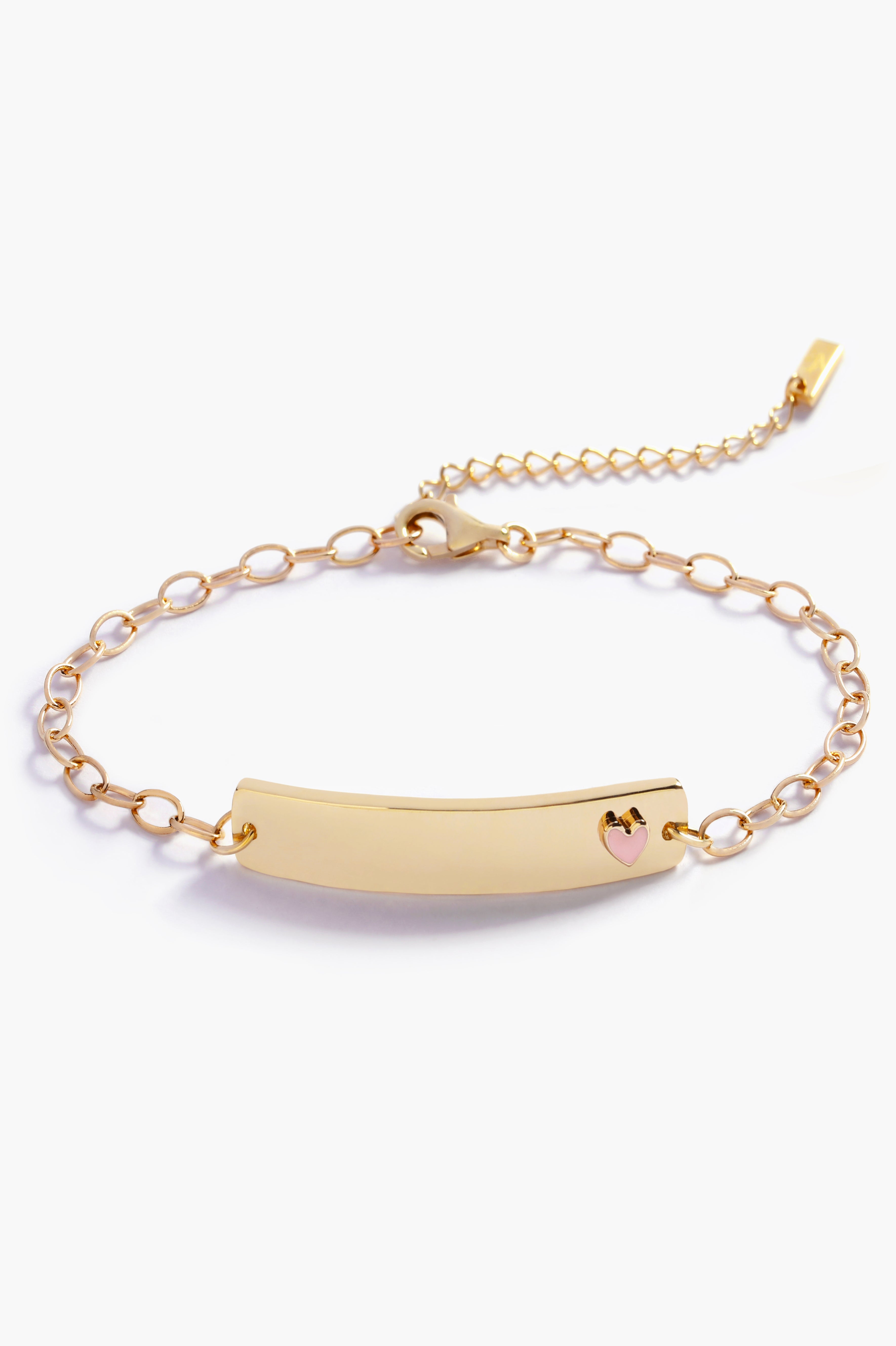 Gold bracelet with a heart charm on a white background