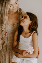 Matching Darling Necklaces with engraved pendants worn by mum and daughter