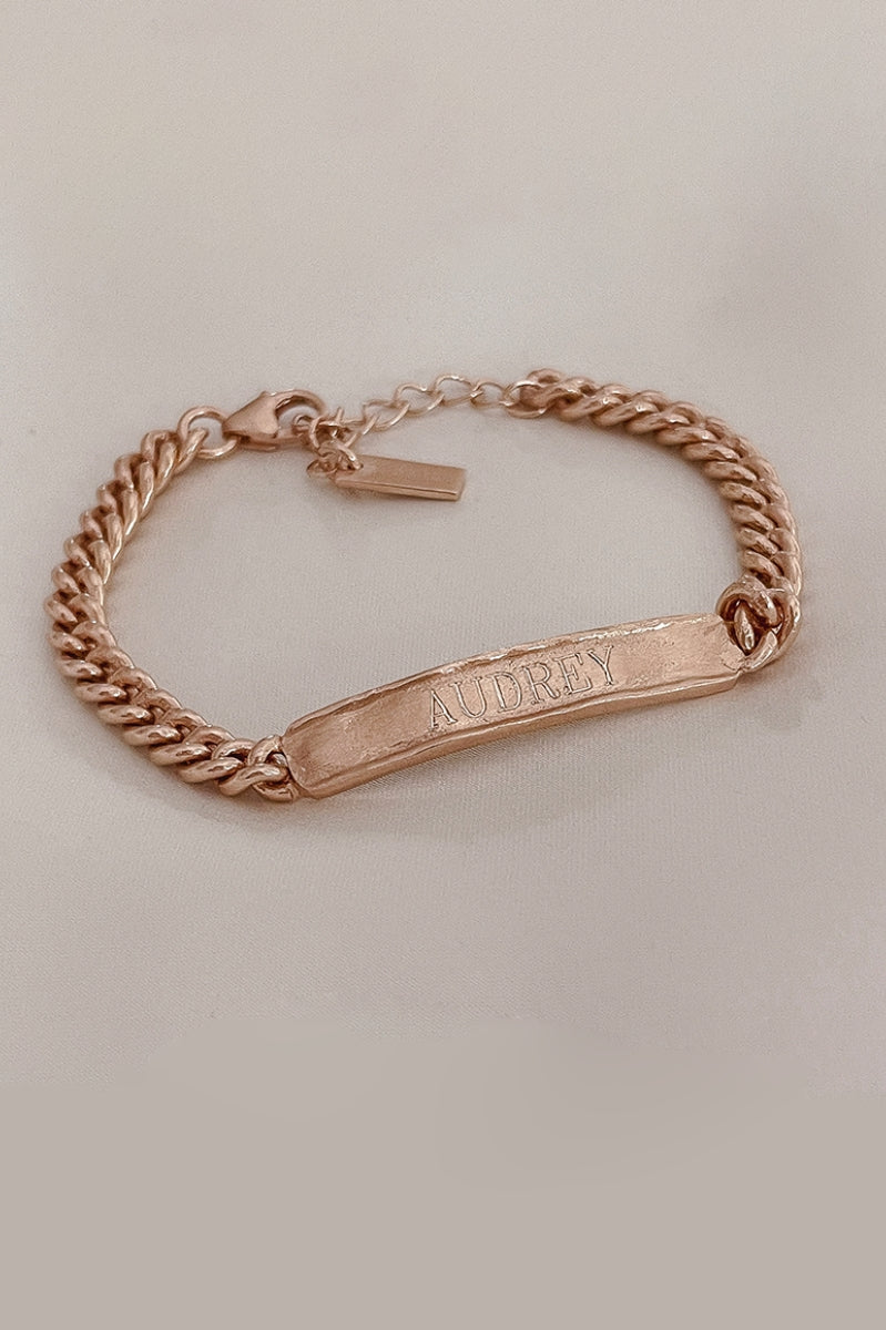 Signature bracelet in rose gold engraved with a child’s name, crafted for everyday wear and meaningful gifting
