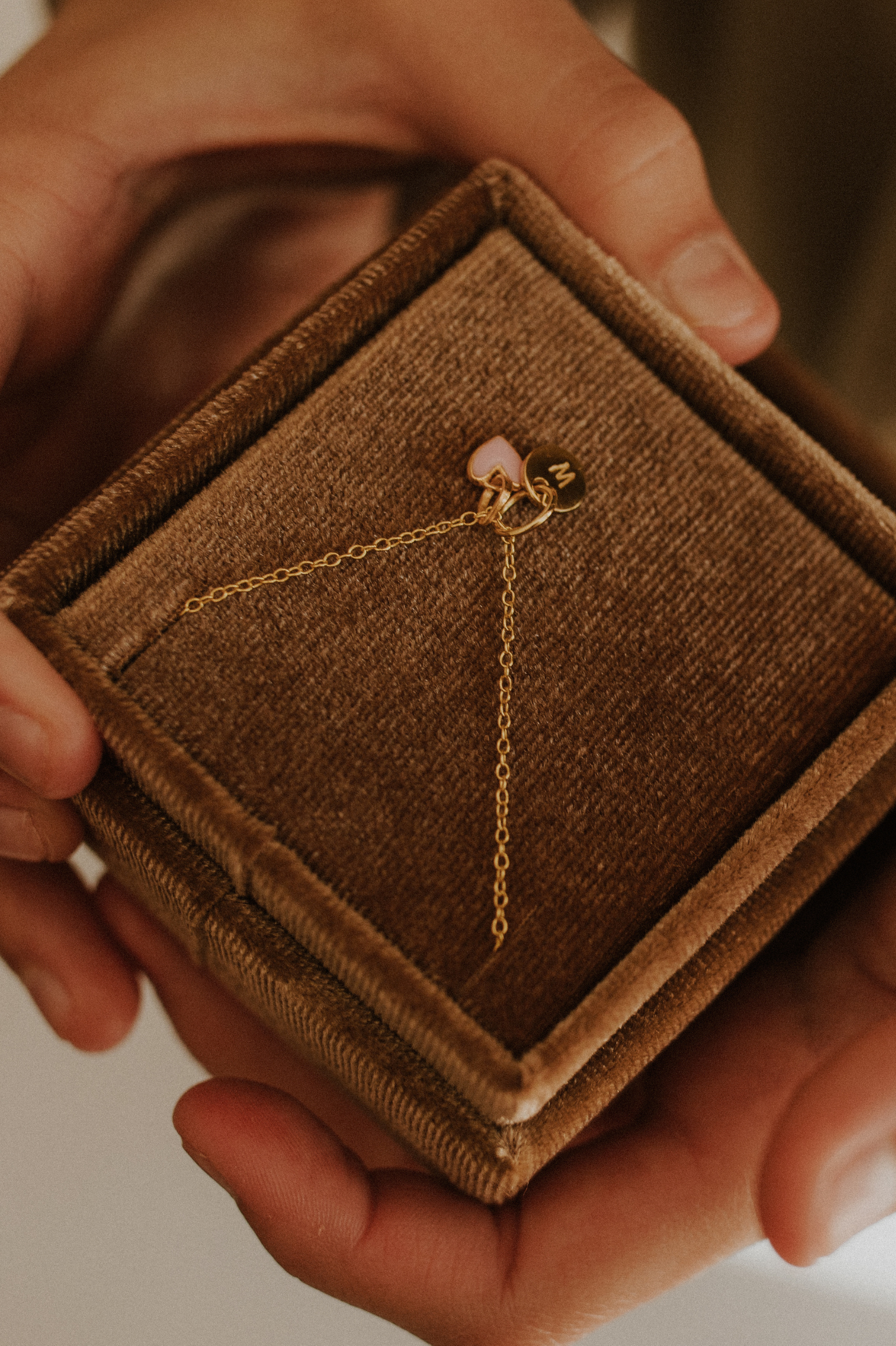 Pink Petite Darling gold necklace with engraved disc and heart charm in velvet gift box