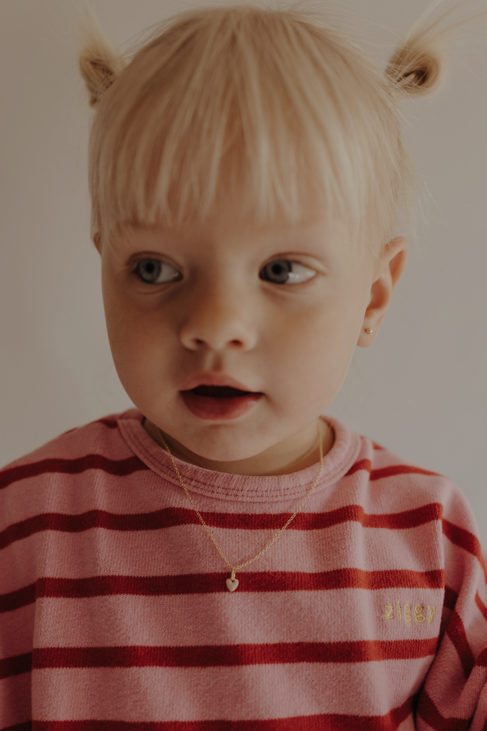 Toddler wearing pink petite Darling Necklace Gold