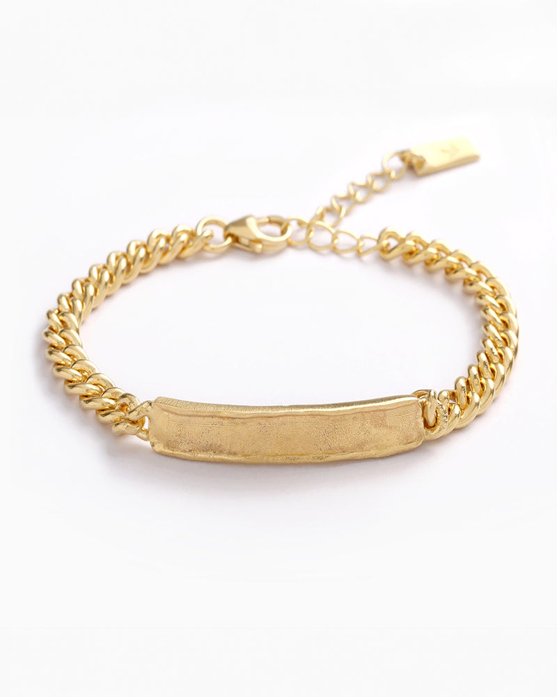Engraved gold bracelet with curb chain, a meaningful personalised keepsake for adults and children by Bluebird Jewellery.