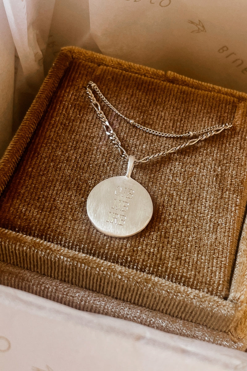 Personalised silver pendant necklace with fine layering chain.
