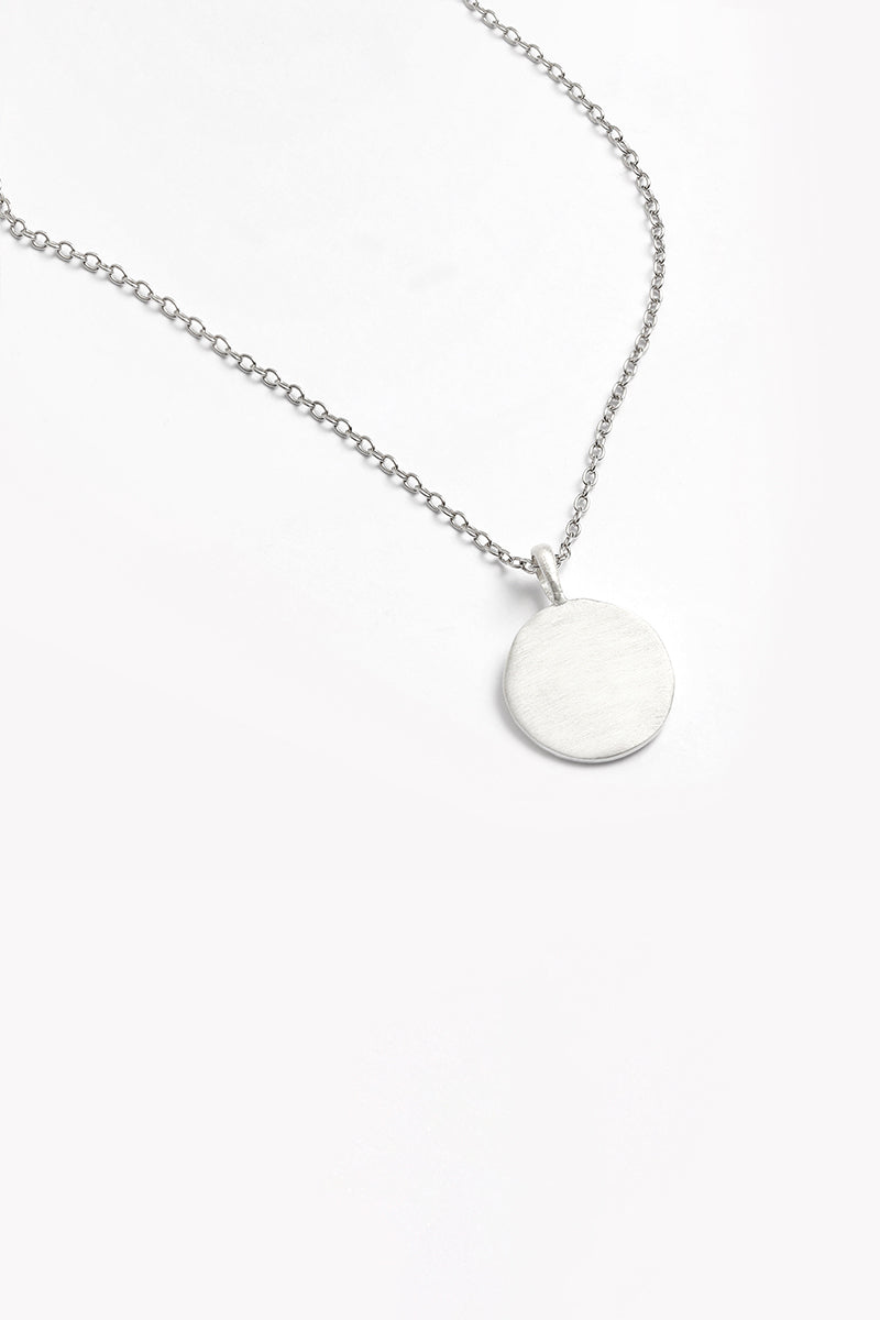 Minimalist sterling silver necklace with unengraved disc pendant, ready for personalisation.