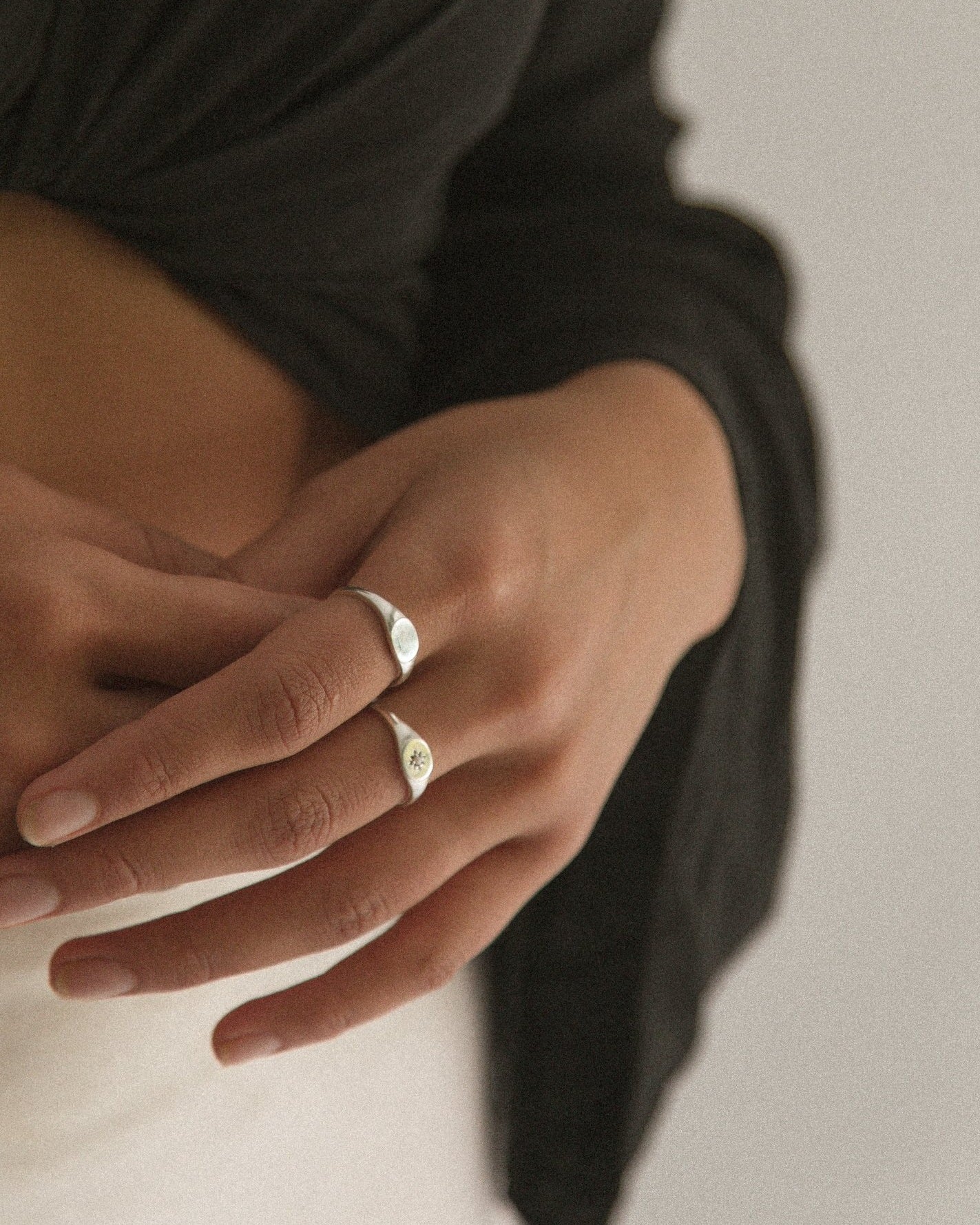 Signet Ring without engraving is worn on a pointer finger in size 7. The ring looks timeless and elegant.