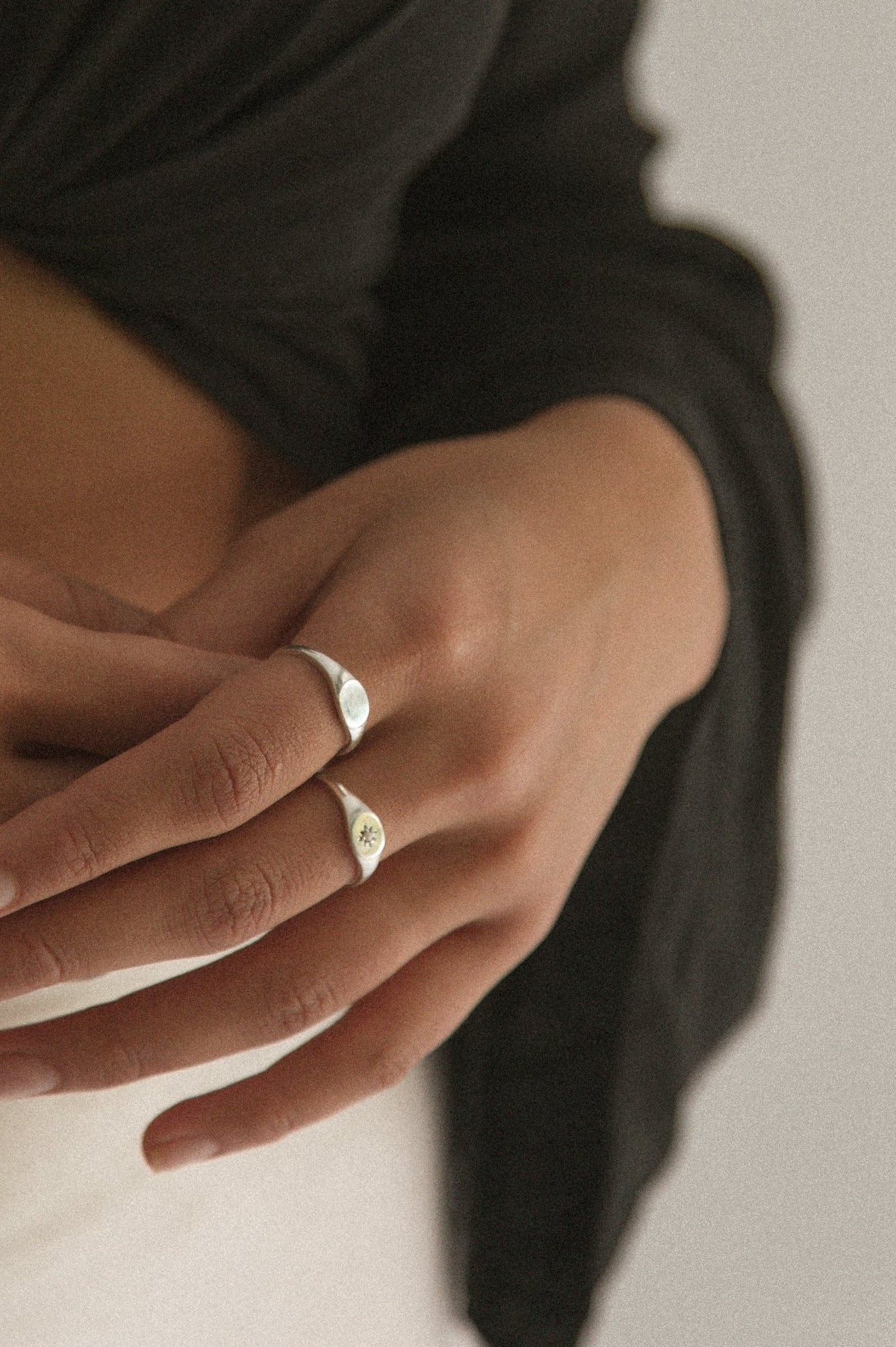 Signet Ring without engraving is worn on a pointer finger in size 7. The ring looks timeless and elegant.