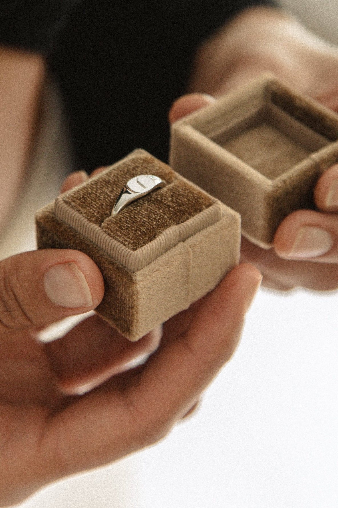 A Signet Ring with personalised engraving sits inside a beautiful velvet ring gift box.